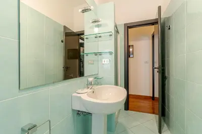 Bagno di GuestHost - Castagneto Holiday & Relax Apartment