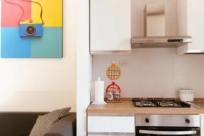 Cucina o angolo cottura di peach apartment
