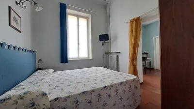 Letto o letti in una camera di Corte Fitti guest house