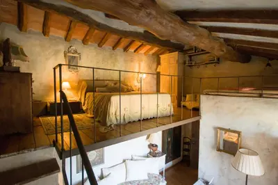 Letto o letti in una camera di Locanda dei Melograni