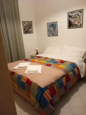 Letto o letti in una camera di CASA DONATELLA a pochi passi dal mare