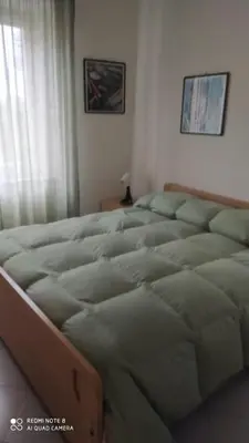 Letto o letti in una camera di CASA DONATELLA a pochi passi dal mare