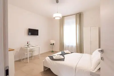TV o dispositivi per l'intrattenimento presso Mentana Guest House