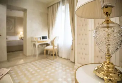 Letto o letti in una camera di Best Western Premier Milano Palace Hotel