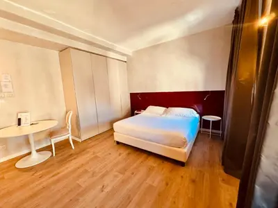 Letto o letti in una camera di Hotel Pex Mantova