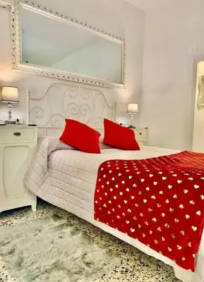 Letto o letti in una camera di Casetta Ambretta