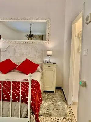 Letto o letti in una camera di Casetta Ambretta