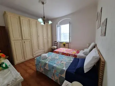 Letto o letti in una camera di Casa vacanze Cu'mme