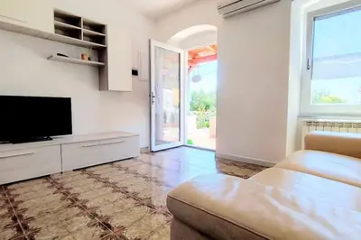 TV o dispositivi per l'intrattenimento presso Casa Arcobaleno - giardino e parcheggio gratuito
