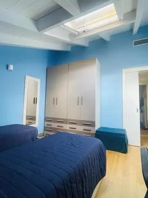 Letto o letti in una camera di Residenza Emma Moneglia