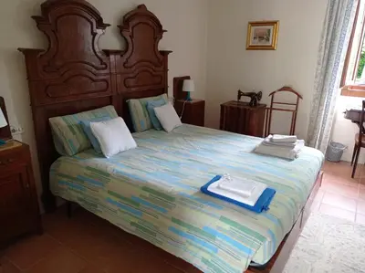 Letto o letti in una camera di Dulcius ex Asperis Bed & breakfast