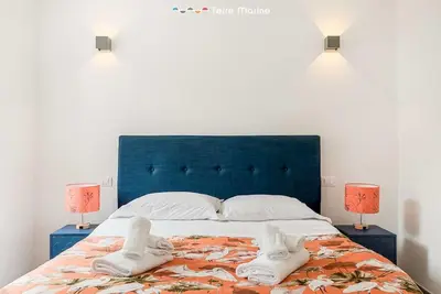 Letto o letti in una camera di Pietra Futura, TerreMarine