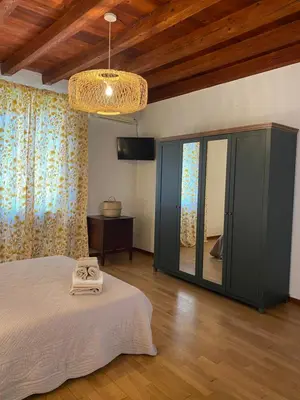 Letto o letti in una camera di Nel Cuore di Volta Mantovana
