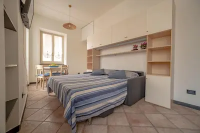 Letto o letti in una camera di Il VICO dei CANTI ROSSI