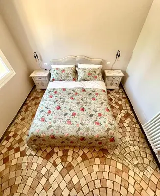Letto o letti in una camera di Al Civico 73