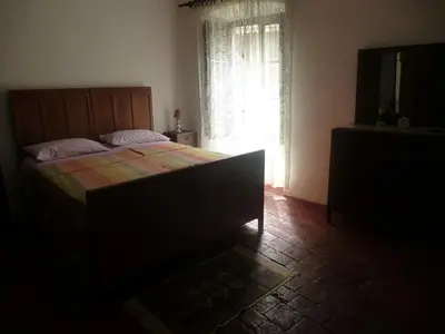 Letto o letti in una camera di Appartamento Piagnaro