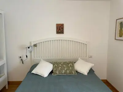 Letto o letti in una camera di Charme nel borgo - Appartamento Maria