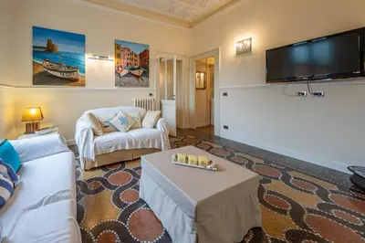 Letto o letti in una camera di RAPALLO BEACH HOUSE A due passi dal mare