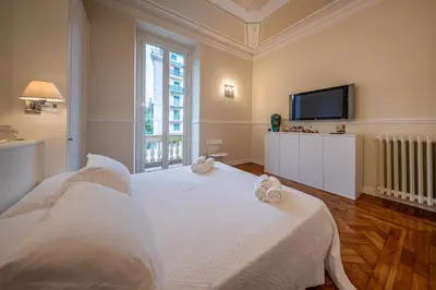 Letto o letti in una camera di RAPALLO BEACH HOUSE A due passi dal mare