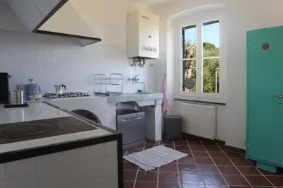 Cucina o angolo cottura di Casa Franguella - Uliveto sul mare