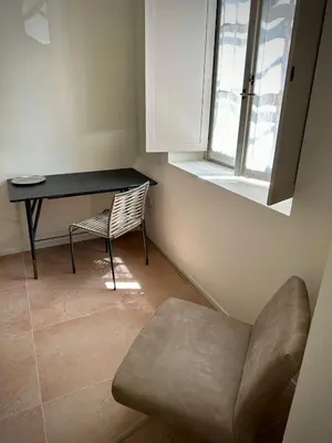 Area soggiorno di Grey-Fontanelli Luxury Suite Reggio Emilia