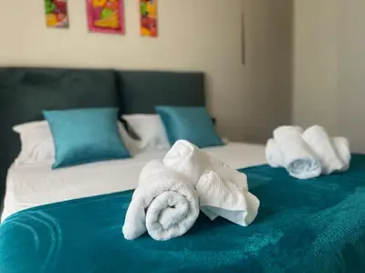 Letto o letti in una camera di UrbanSuite Il Nido Guest House