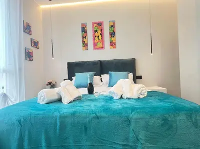 Letto o letti in una camera di UrbanSuite Il Nido Guest House