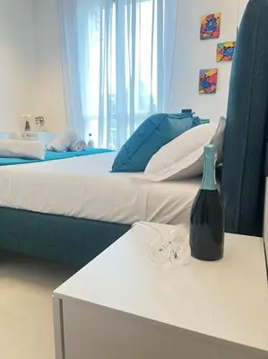 Letto o letti in una camera di UrbanSuite Il Nido Guest House
