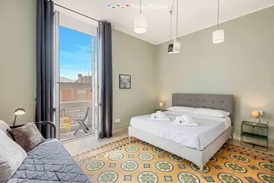 Letto o letti in una camera di Easy Breezy, TerreMarine