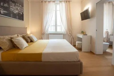Letto o letti in una camera di Suites Appartamento 2 bagni - Freedom SUITES
