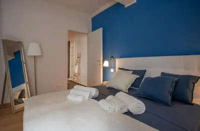 Letto o letti in una camera di Suites Appartamento 2 bagni - Freedom SUITES