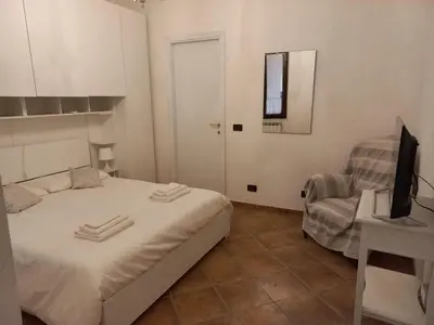 Letto o letti in una camera di Livia's House - Vezzano Ligure vicino Cinque 5 terre