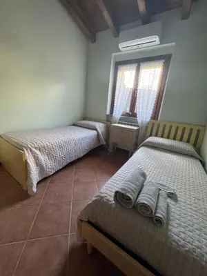 Letto o letti in una camera di Beb ulivo