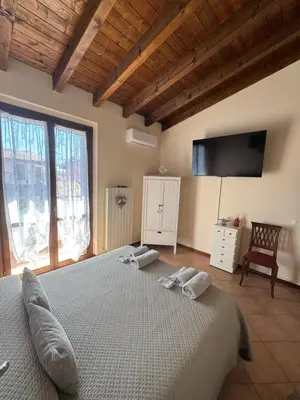 Letto o letti in una camera di Beb ulivo