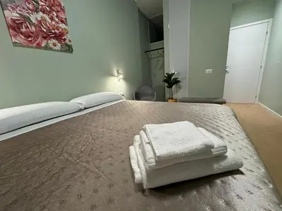 Letto o letti in una camera di Le Porte di Parma