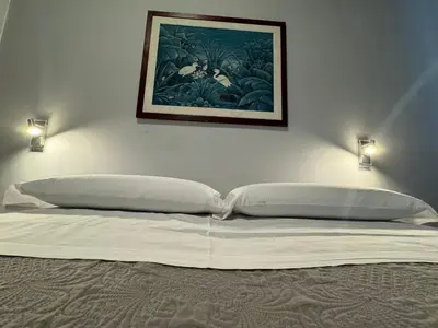 Letto o letti in una camera di Le Porte di Parma