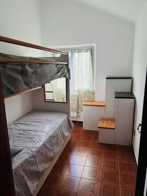 Letto o letti in una camera di Casa Alessio a 15 minuti dal mare