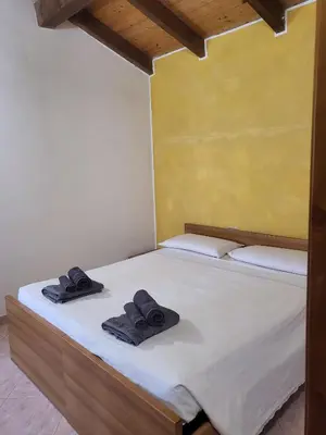 Letto o letti in una camera di La Locanda del Maggiociondolo