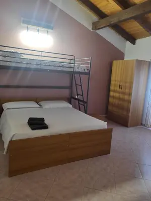 Letto o letti in una camera di La Locanda del Maggiociondolo