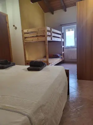 Letto o letti in una camera di La Locanda del Maggiociondolo