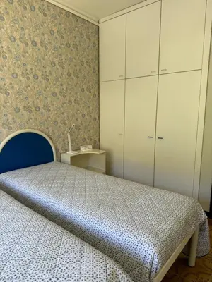 Letto o letti in una camera di casa degli ulivi