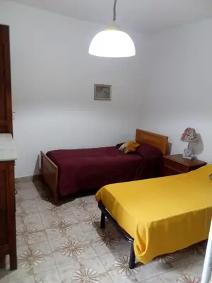 Letto o letti in una camera di Casa vacanza toscana