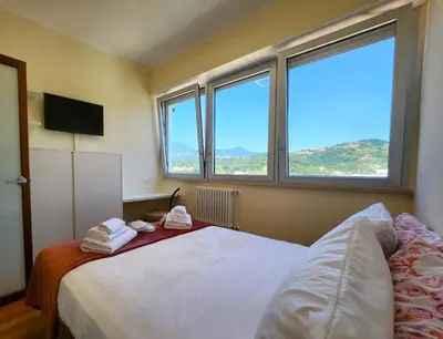 Letto o letti in una camera di Appartamento Decimo Cielo Vista Mare