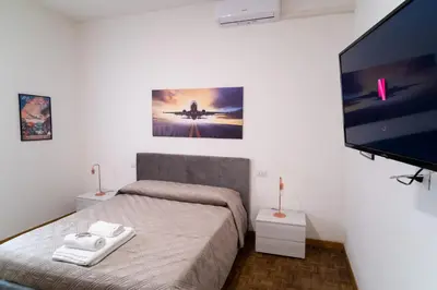 Letto o letti in una camera di Casa vacanze Dream&Fly