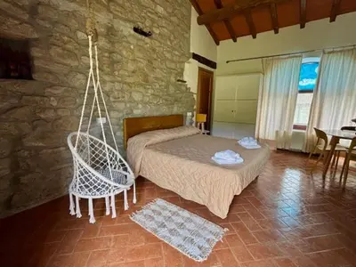 Letto o letti in una camera di Masseria dell'oltrepo'