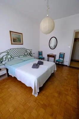 Letto o letti in una camera di Angolo Azzurro by PortofinoVacanze