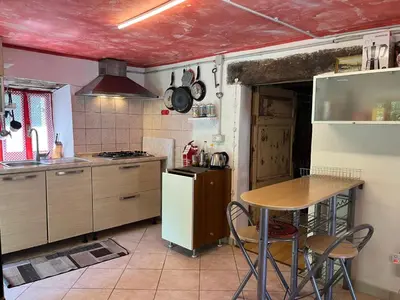 Cucina o angolo cottura di Agriturismo antico mulino sul Dolo