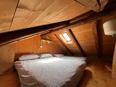 Letto o letti in una camera di Agriturismo antico mulino sul Dolo