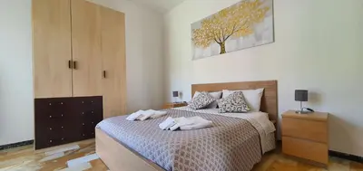 Letto o letti in una camera di Casa Vacanze Nonna Papera near Cinque Terre