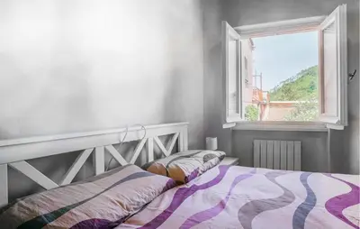 Letto o letti in una camera di Awesome Apartment In Carro With Wifi